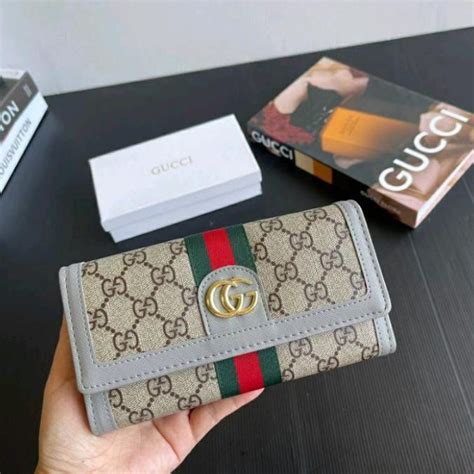 Carteras y monederos Gucci para mujer — FARFETCH.